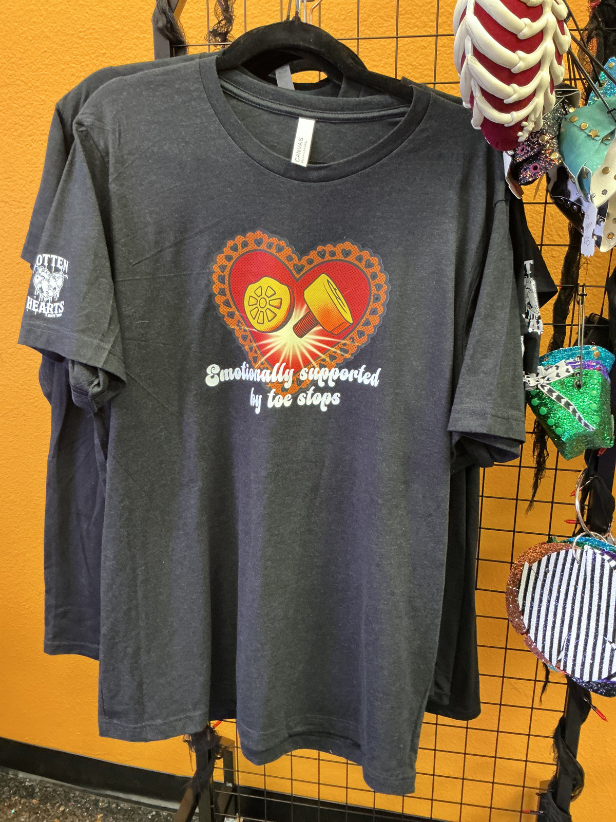 RH Tee- “Emotionally supported by toe stops”